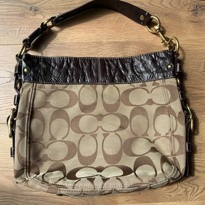 Brown coach purse with purple fabric inside. Gently used. Non smoking home.